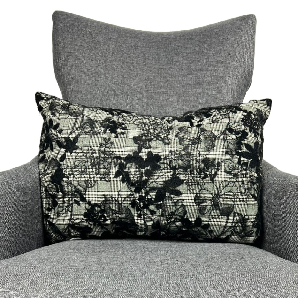 Checkered background black velour decorative pillow with embroidered floral design